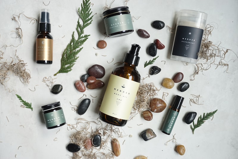 A dropper bottle of skincare serum resting on a soft neutral background